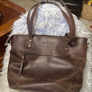 - The Eva Leather Tote from Montana Hudson